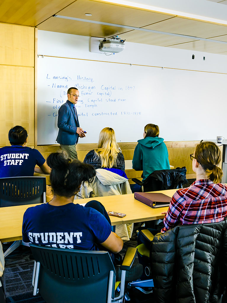 students and faculty in a classroom