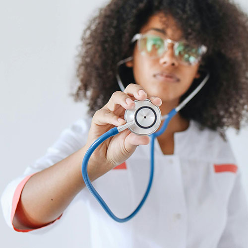 Medical student holding a stethoscope