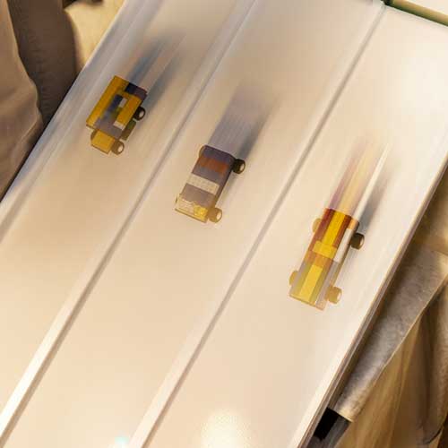 Toy Cars going down incline plain