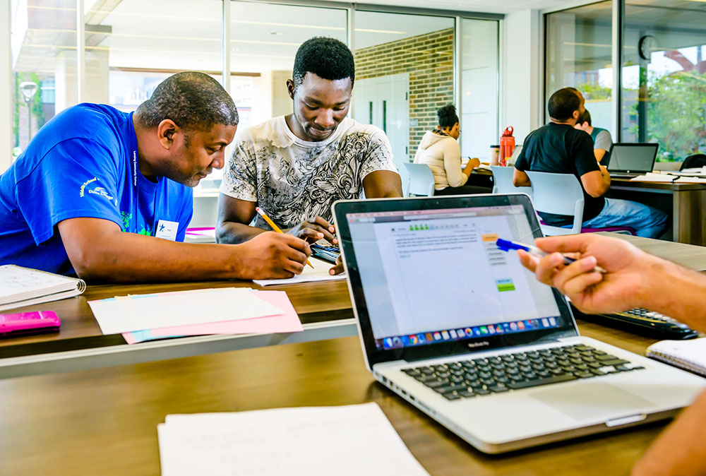 student getting help in the learning commons