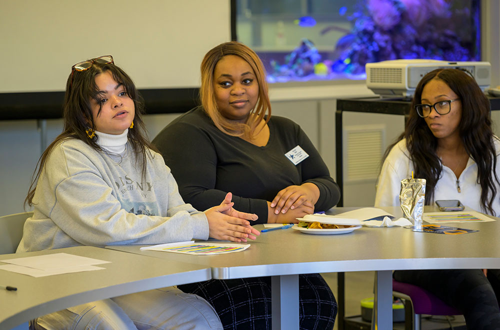 group of three women at a wise events