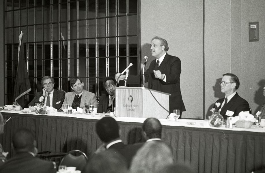 Speaker at a conference.