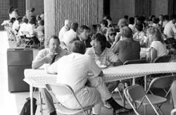 Employees eating outside the Gannon Building.