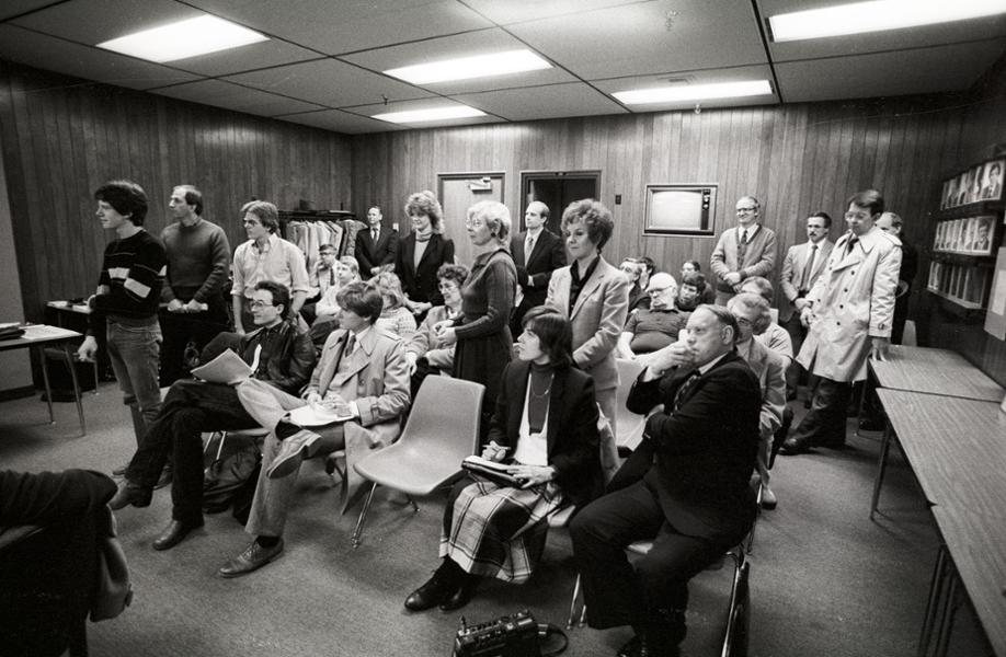 Audience at a Board meeting.