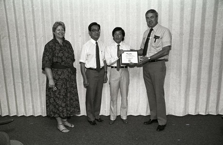 Image 117 - Presenting an Award