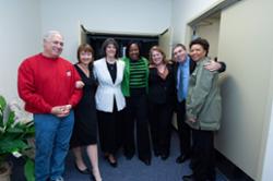 LCC staff and administrators pose together at the dedication of the Paula D. Cunningham Administration Building on the Downtown Campus.