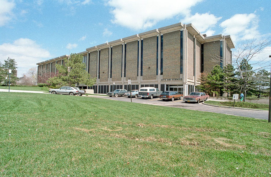 The west side of the Arts and Sciences Building and an open green space where the TLC building now stands - ca. 1980-1998